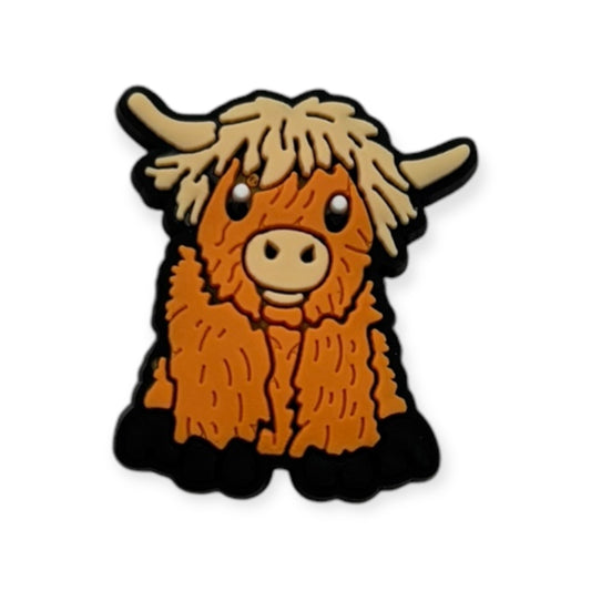 Sitting Highland Cow